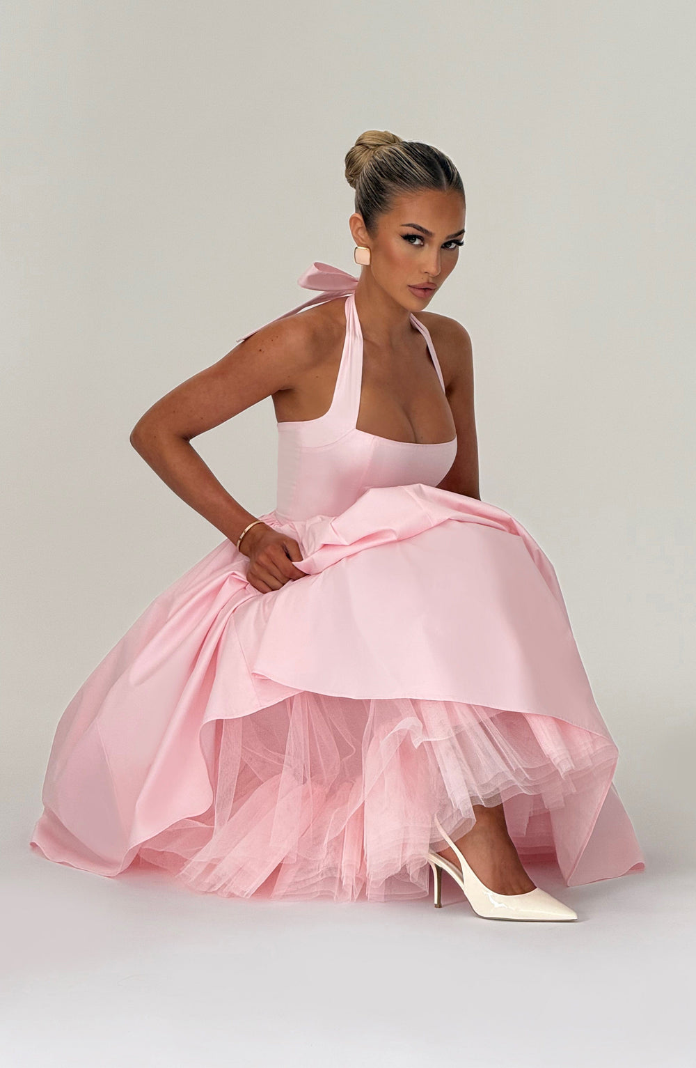 Blueberry Tessa vintage halter midi dress in pink with a voluminous flared skirt and lace-up back.